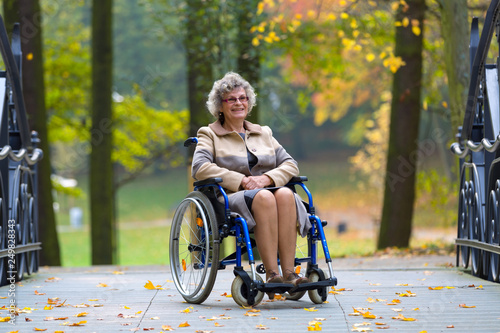 older woman on wheelchair in the park