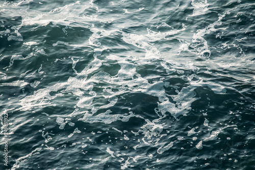 Sea water waves, ocean surface background, abstract aqua or liquid texture © DedMityay