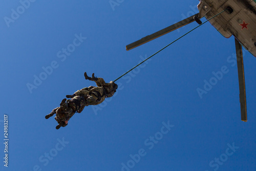 Special Forces descend on a rope