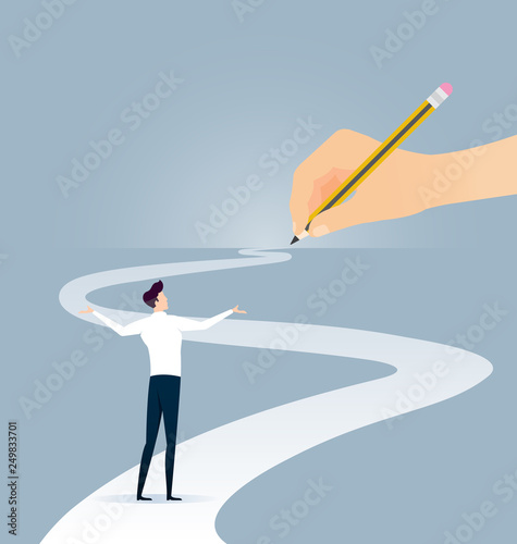 Hand holding pencil. Concept of the path to business success at choose your own. photo