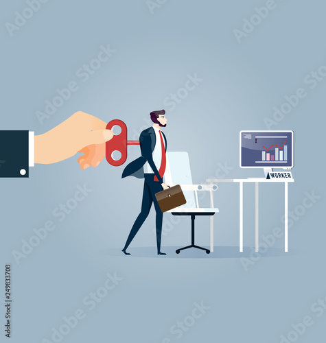 Hand turning winder on business person's back. Control concept