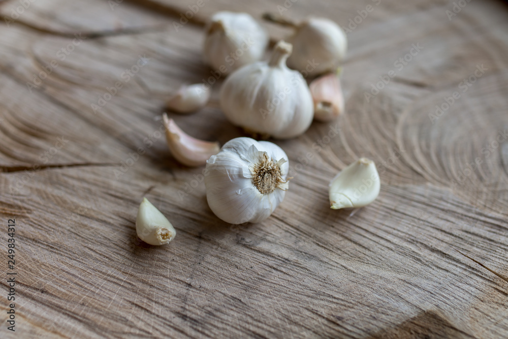 garlic on a wooden table garlic on a wooden table