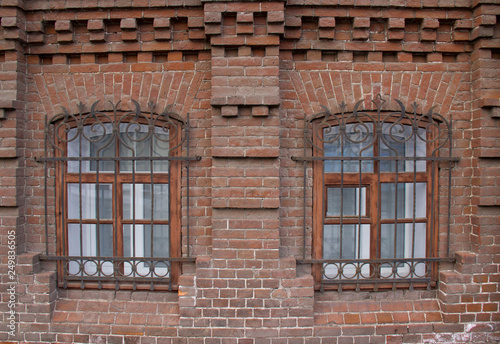 Vintage Windows in a brick house. © Анатолий Казаков