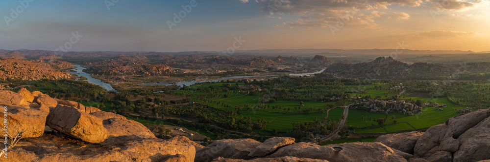 panoramic view at sunset from the monkey temple hill over hampi india karnakata