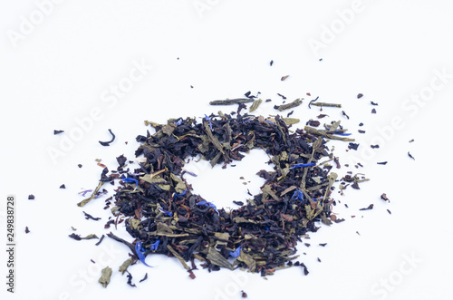 Composite heart-shaped tea with blue flowers