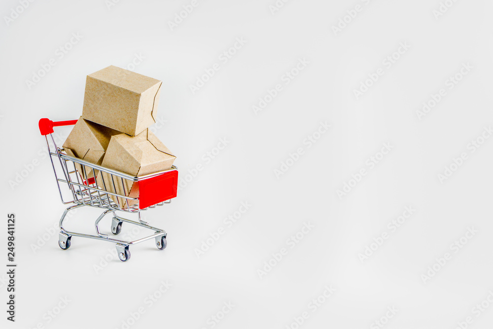 Shopping cart and box isolated on white background , business , shopping concept. Selective focus