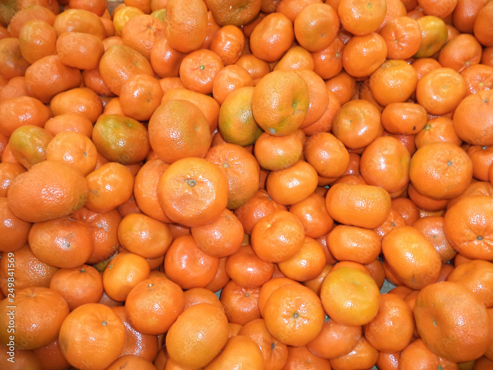 a bunch of ripe fresh juicy tangerines