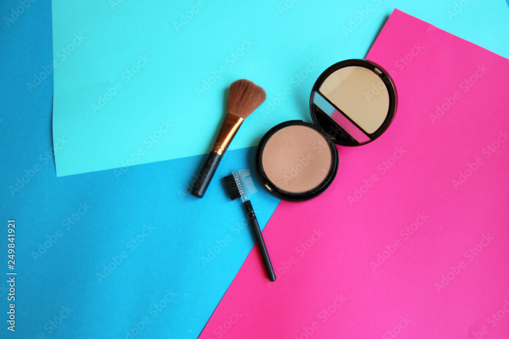 background cosmetics powder brush blue pink orange background cosmetics powder brush blue pink orange