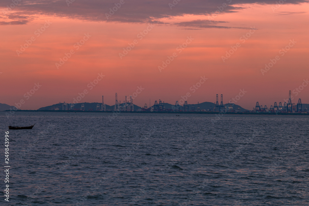 Natural background during the sunrise, horizon by the sea, Twilight light wallpaper of bright orange sky. 
