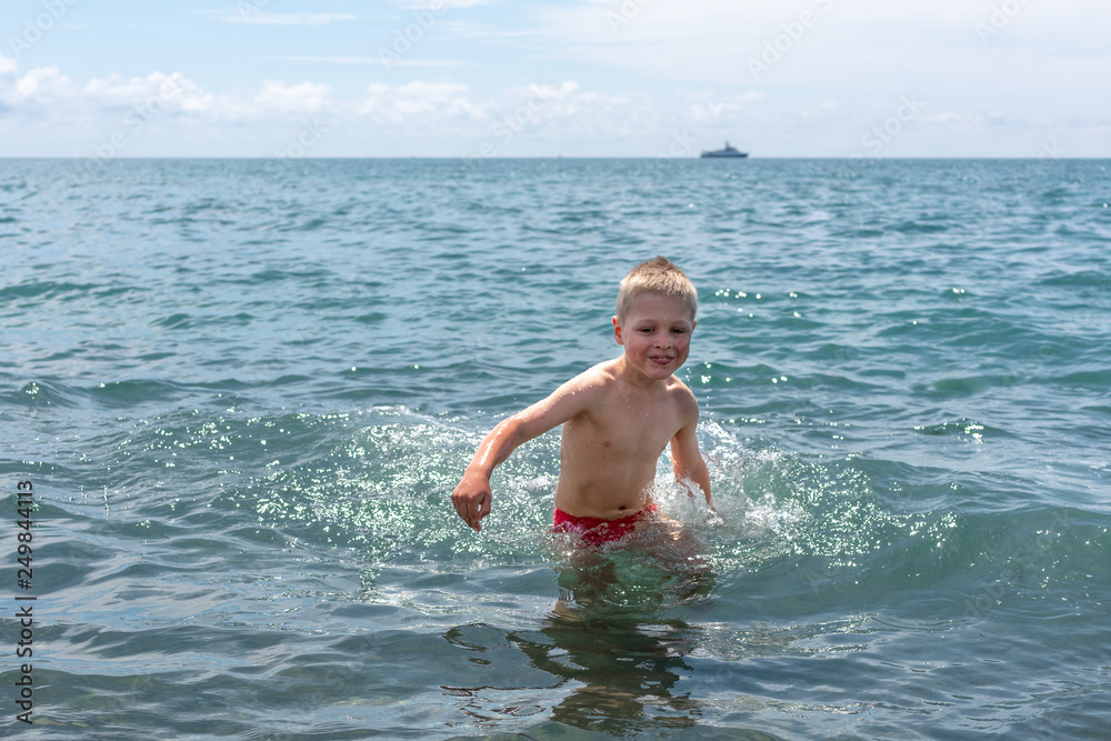 Boy swimming in the sea