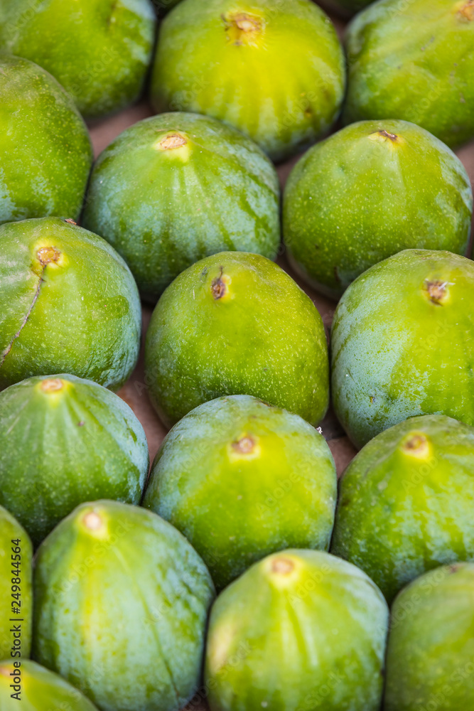 Background ripe figs without GMOs on the market in Milan, Italy. Background ripe figs without GMOs on the market in Milan, Italy.