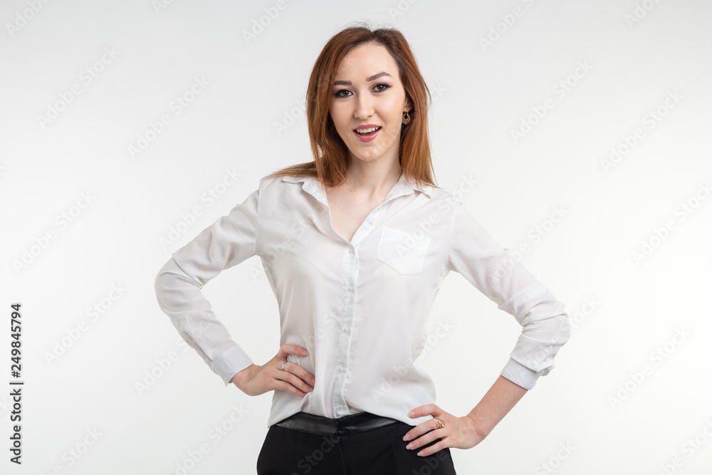 Fashion, style and people concept - pretty young asian woman over white backgroung