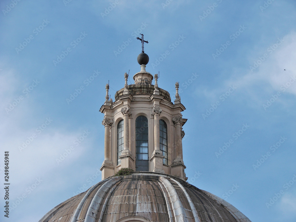 Forum of Cesari in Rome with Trajan's Column and church in background