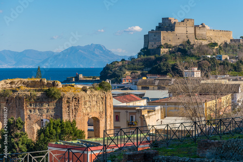 Historic Beauty of Baiae: Ancient Ruins and Majestic Castle Overlooking the Sea, Italy's Timeless Coastal Marvel photo