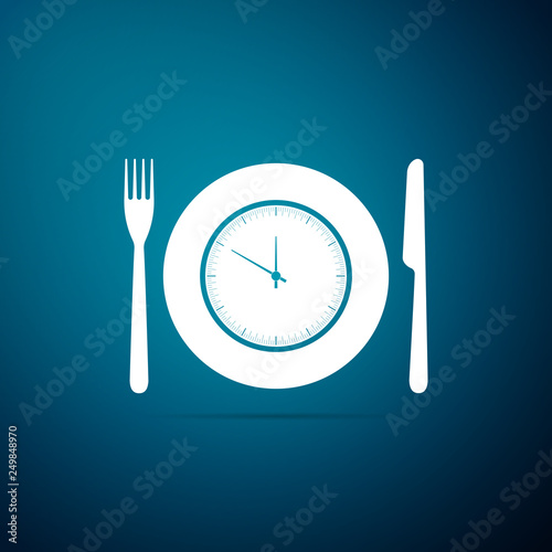 Plate with clock, fork and knife icon isolated on blue background. Lunch time. Eating, nutrition regime, meal time and diet concept. Flat design. Vector Illustration