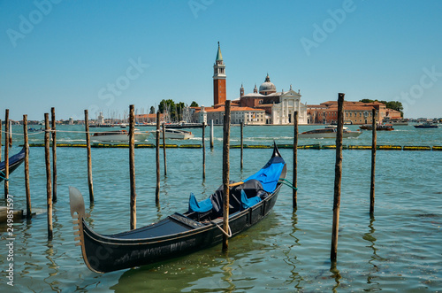 Gondola in Venice. Church of San Giorgio Maggiore with gondolas, Venice, Italy