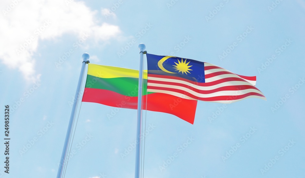 Malaysia and Lithuania, two flags waving against blue sky. 3d image