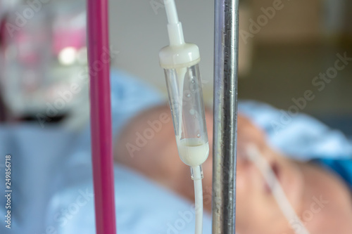 The patient is receiving food through a feeding tube.