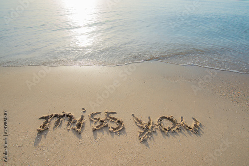 sand beach in the morning sunrise and there is a letter that miss you. an idea of Lonely and nostalgic