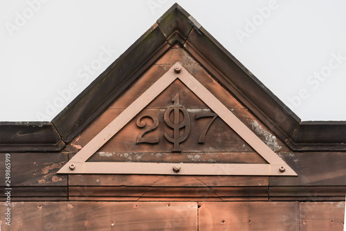 sandstone trianglular roofline detail photo