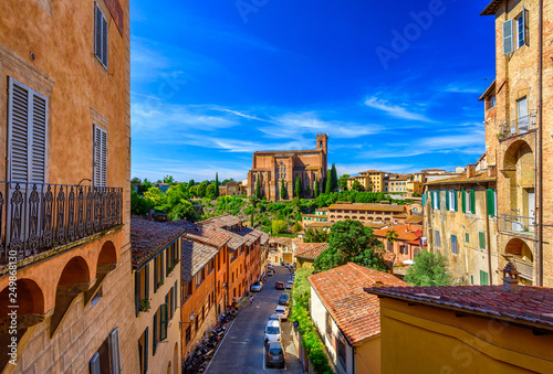 Canvas Print Aerial view of Siena and Basilica of San Domenico (Basilica Cateriniana) is basilica church in Siena, Tuscany, Italy, one of the most important of Siena