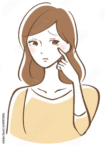 目元を気にする女性　困り顔