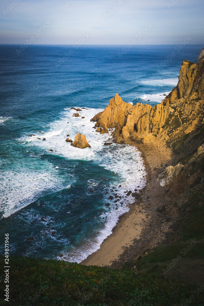 Fototapeta premium Beautiful ocean view of the Praia de Ursa, a wild place near touristic Cabo da Roca lighthouse, Portugal