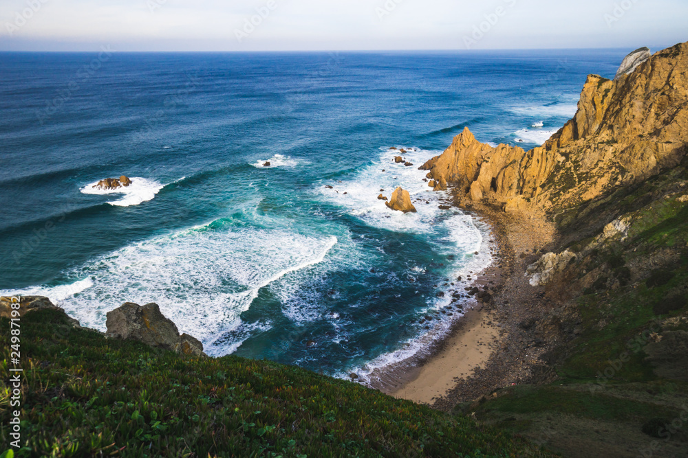 Beautiful ocean view of the Praia de Ursa, a wild place near touristic Cabo da Roca lighthouse, Portugal Beautiful ocean view of the Praia de Ursa, a wild place near touristic Cabo da Roca lighthouse, Portugal