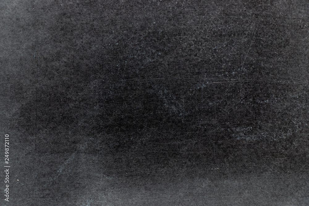 Grunge white color chalk texture on black board background Grunge white color chalk texture on black board background