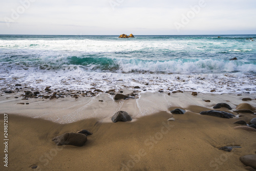 Beautiful ocean view of the Praia de Ursa, a wild place near touristic Cabo da Roca lighthouse, Portugal photo