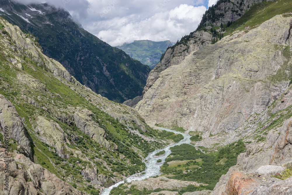 Closeup mountains scenes, walk to Trift Bridge in national park Switzerland