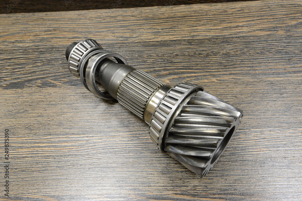 Automatic transmission spare part on wooden background Automatic transmission spare part on wooden background