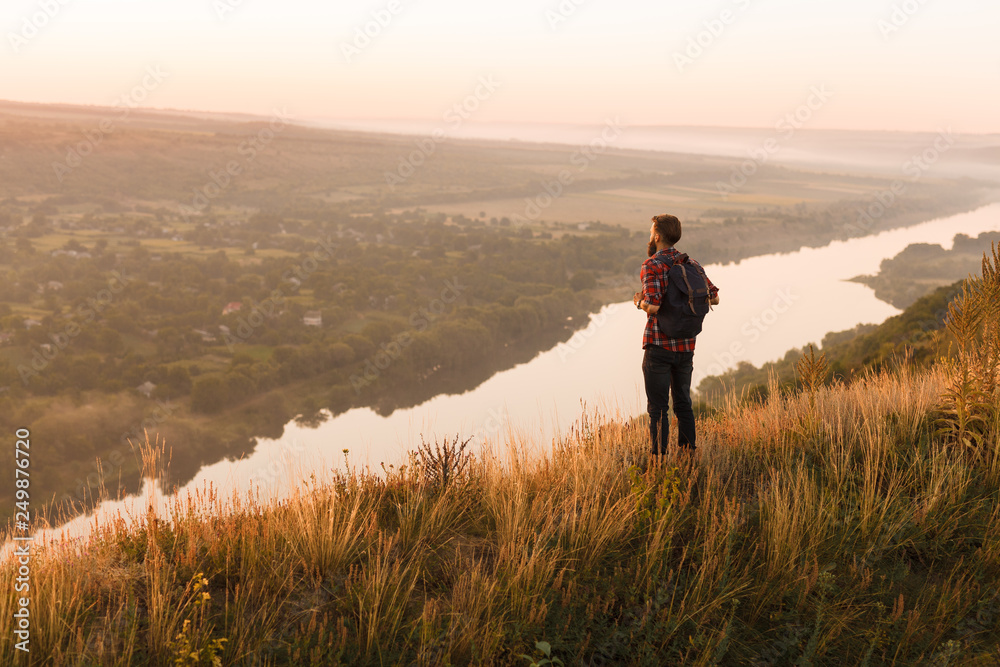 Anonymous traveler admiring view