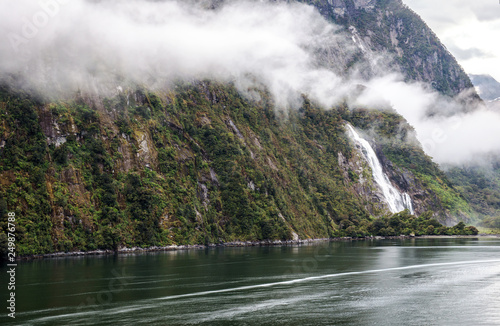 Low, hanging cloud at Bowen Falls in Milford Sound, Fiordland National Park, South Island, New Zealand