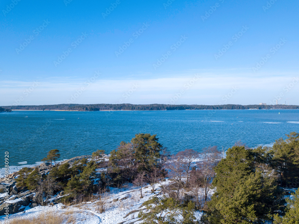 Archipelago in a February, with snow and floating ice. Turku, Finland February 2019.