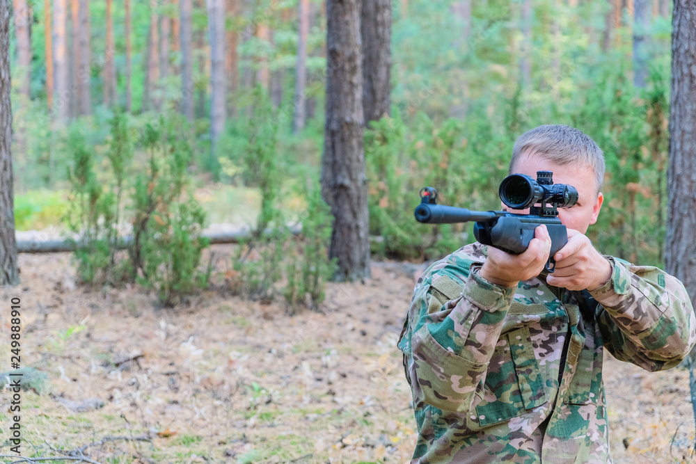 man with rifle