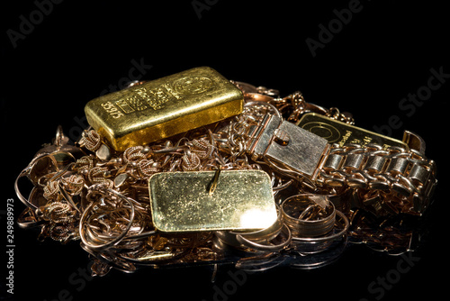 A pile of gold bars and gol...