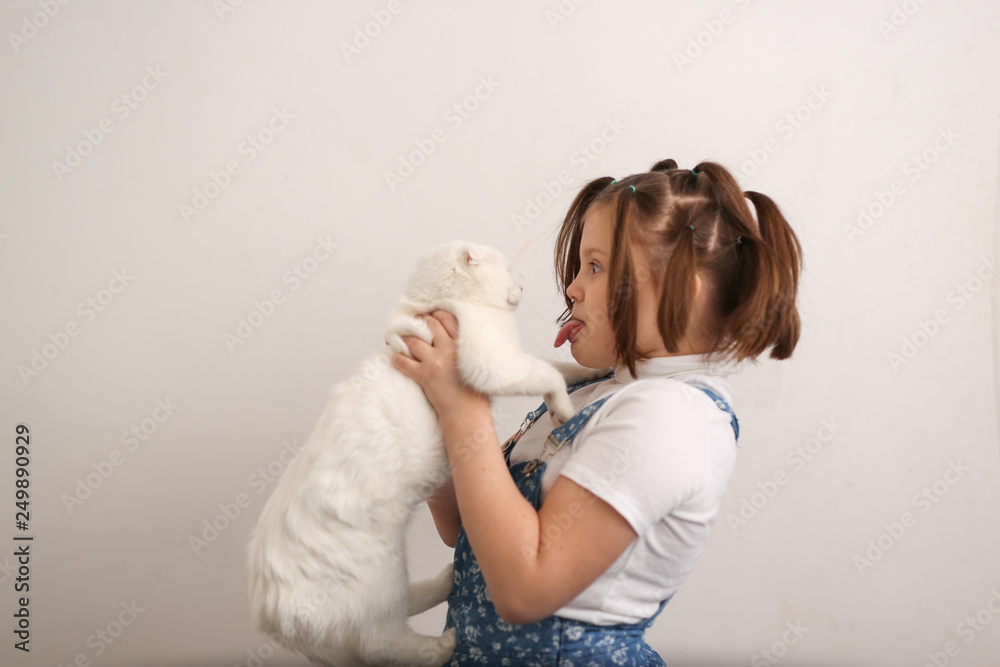 Girl child offends a cat, animal abuse Girl child offends a cat, animal abuse