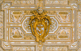 Paulus V coat of arms in the ceiling of the portico in Saint Peter Basilica in Rome, Italy.