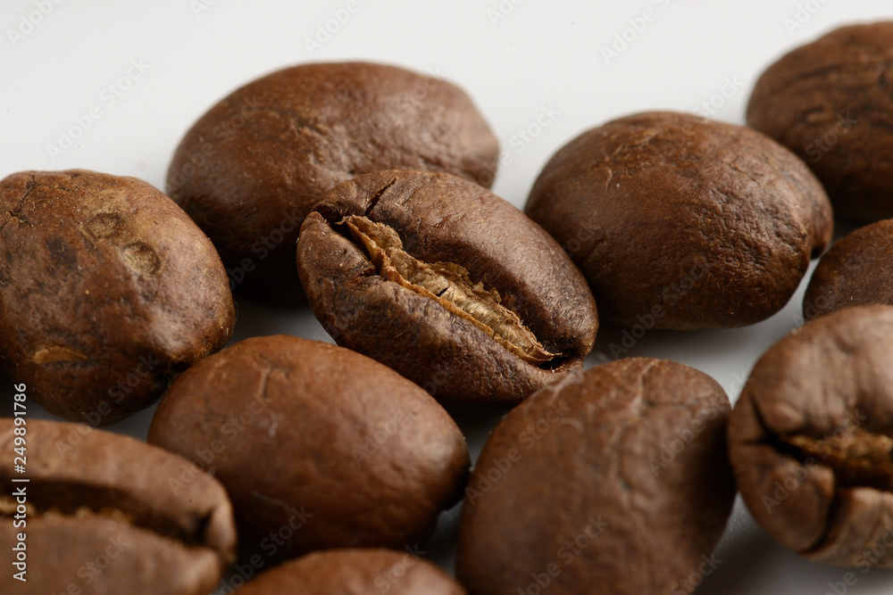 coffee grains on a white background, close-up, coffee roasting coffee grains on a white background, close-up, coffee roasting