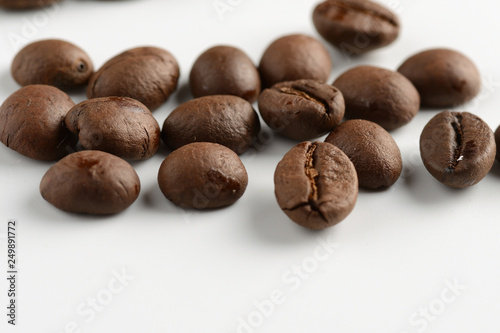 coffee grains on a white background  close-up  coffee roasting