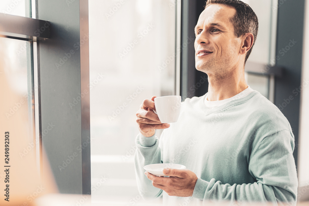 Man feeling happy waiting for his wife from work Man feeling happy waiting for his wife from work