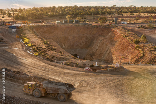 Truck laden with ore leaving a mine tunnel at a copper mine in NSW, Australia