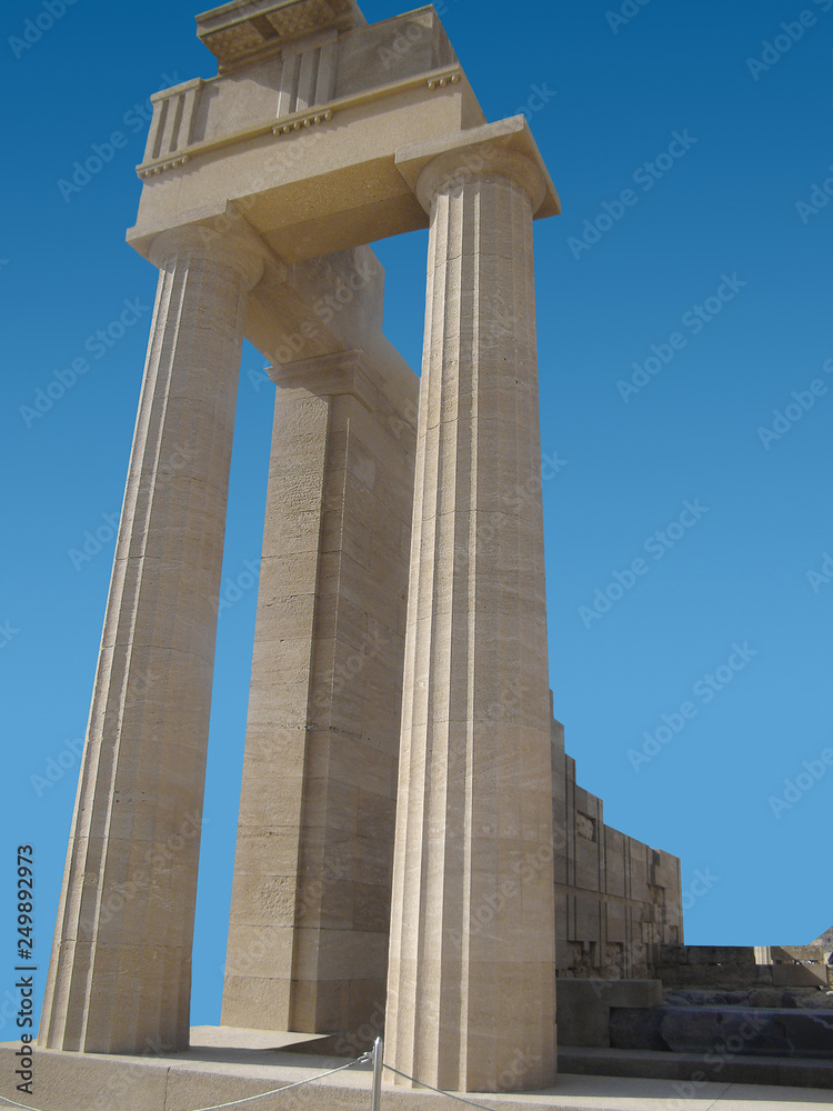    ancient roman columns on a blue background