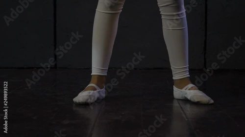 Close Up Leg Shot Of A Dancer Performing Shuffle Footwork In A Dance Studio photo
