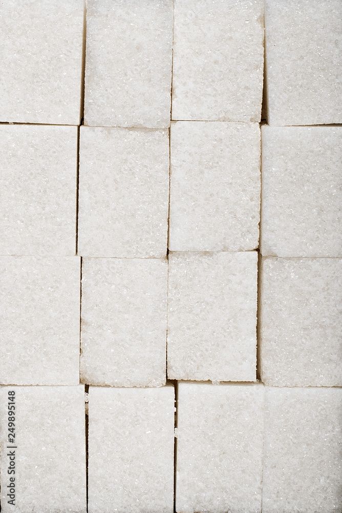 background from cubes of white sugar refined background from cubes of white sugar refined