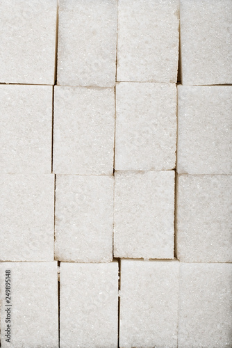 background from cubes of white sugar refined