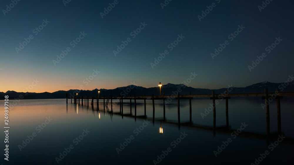 old wooden pier at sunrise