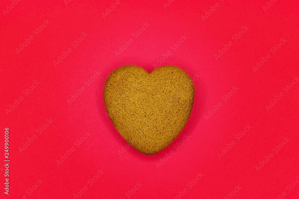 Fototapeta premium Valentine's day cookies on stand against wooden background