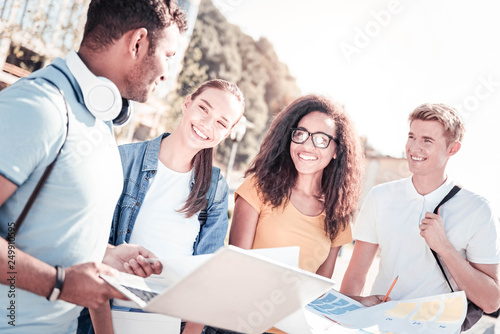 Принти на полотні Young colleagues working together at their project